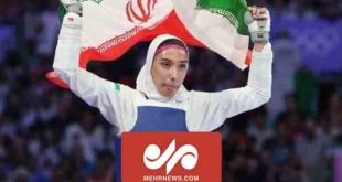دور افتخار نعمت زاده با پرچم ایران پس از کسب مدال برنز المپیک - خبرگزاری مهر | اخبار ایران و جهان
